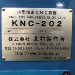 Nameplate of Kitamura KNC-202 CNC lathe