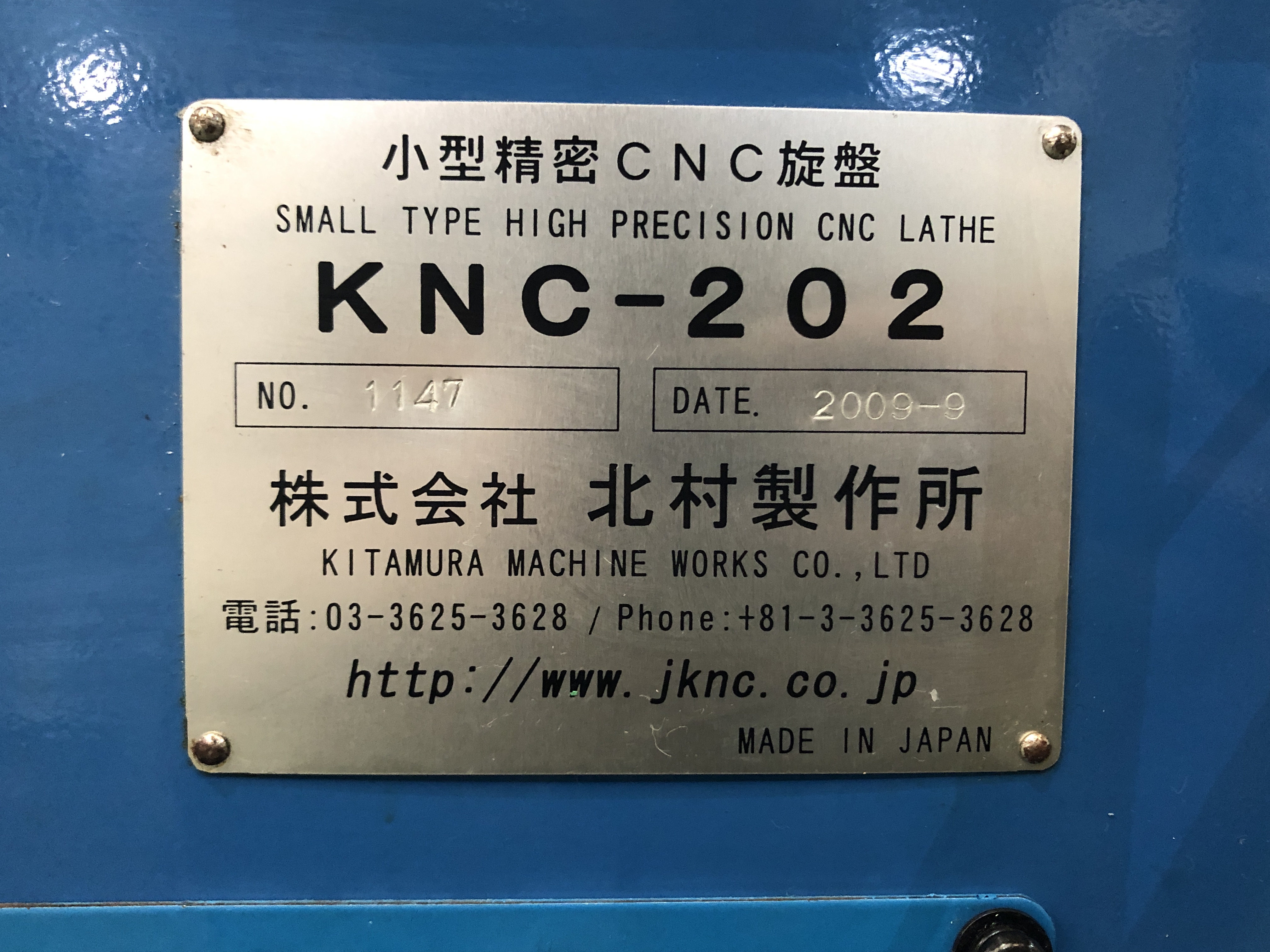 Nameplate of Kitamura KNC-202 CNC lathe